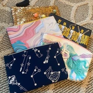 Set of 5 colorful makeup/travel pouches. Like new. Great for travel/hotel/gym.